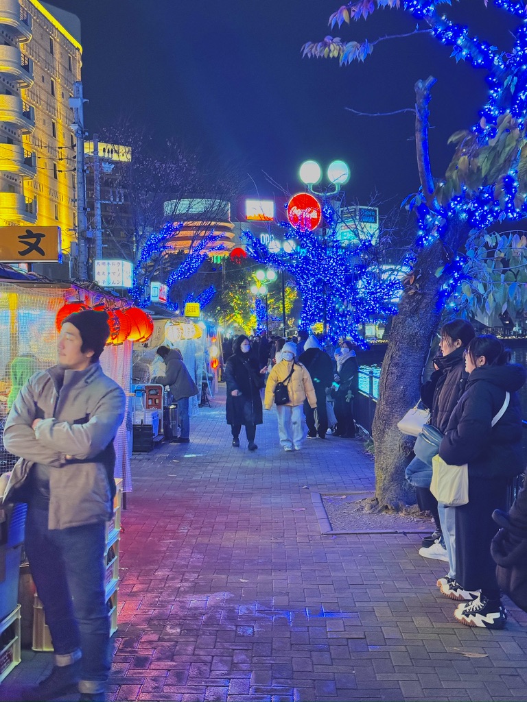 A serene, traditional street in the onsen town of Yufuin