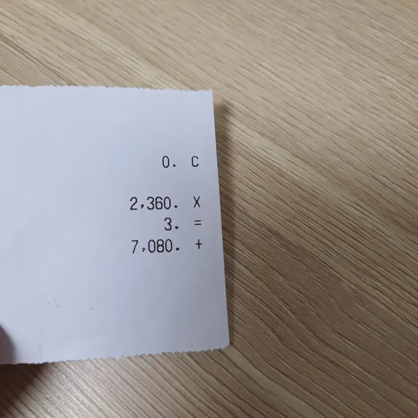 Exchange rate at Ha Tam in Ho Chi Minh City, showing VND per 100 USD.